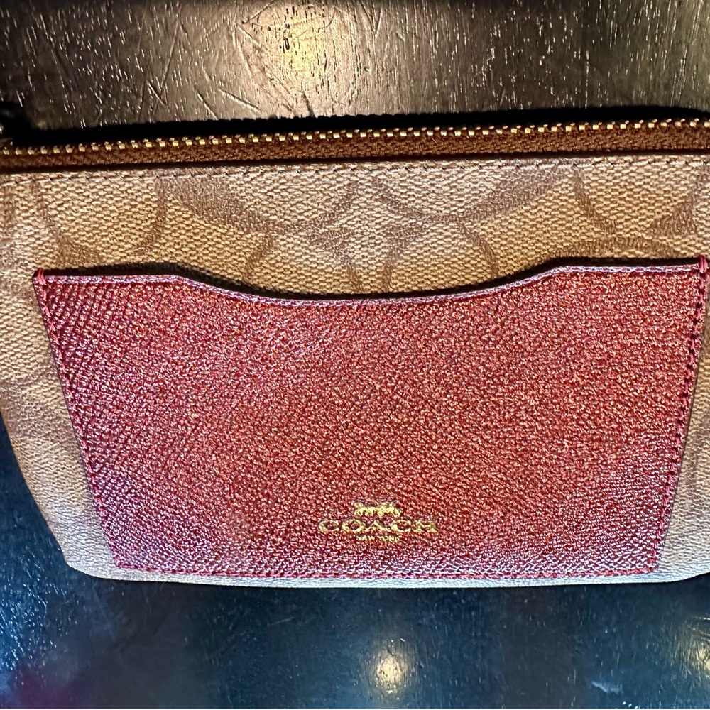 Coach Pink and Brown Wristlet with Signature Pattern